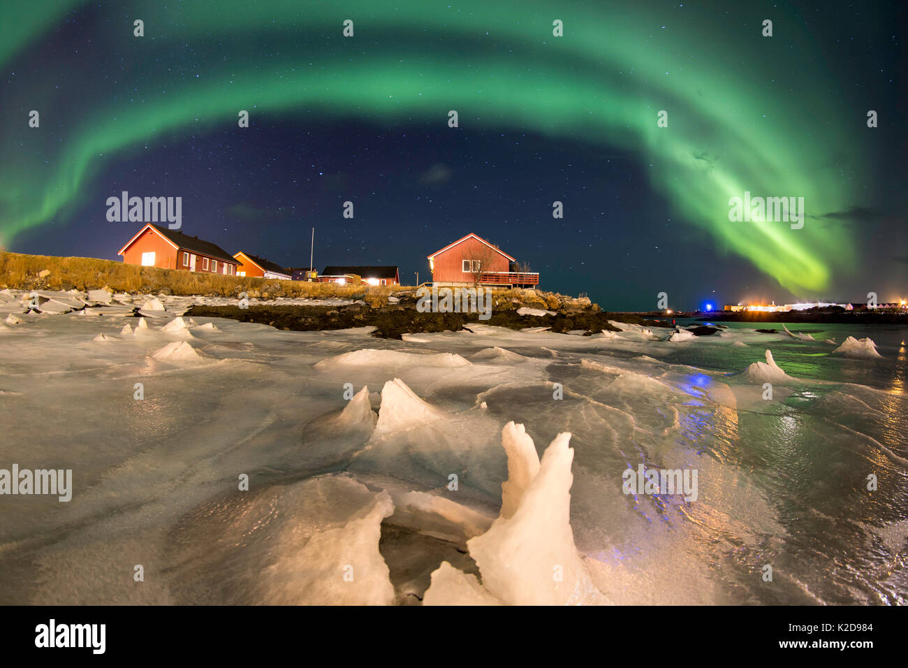 Northern lights over Andenes village,  Andenes, Andoya island, North Atlantic Ocean, Norway, January 2016 Stock Photo