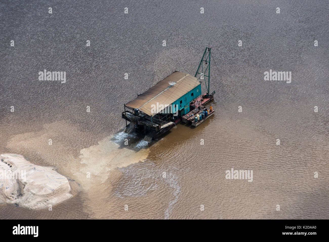 Aerial view of gold dredger in Essequibo river, Guyana South America Stock Photo