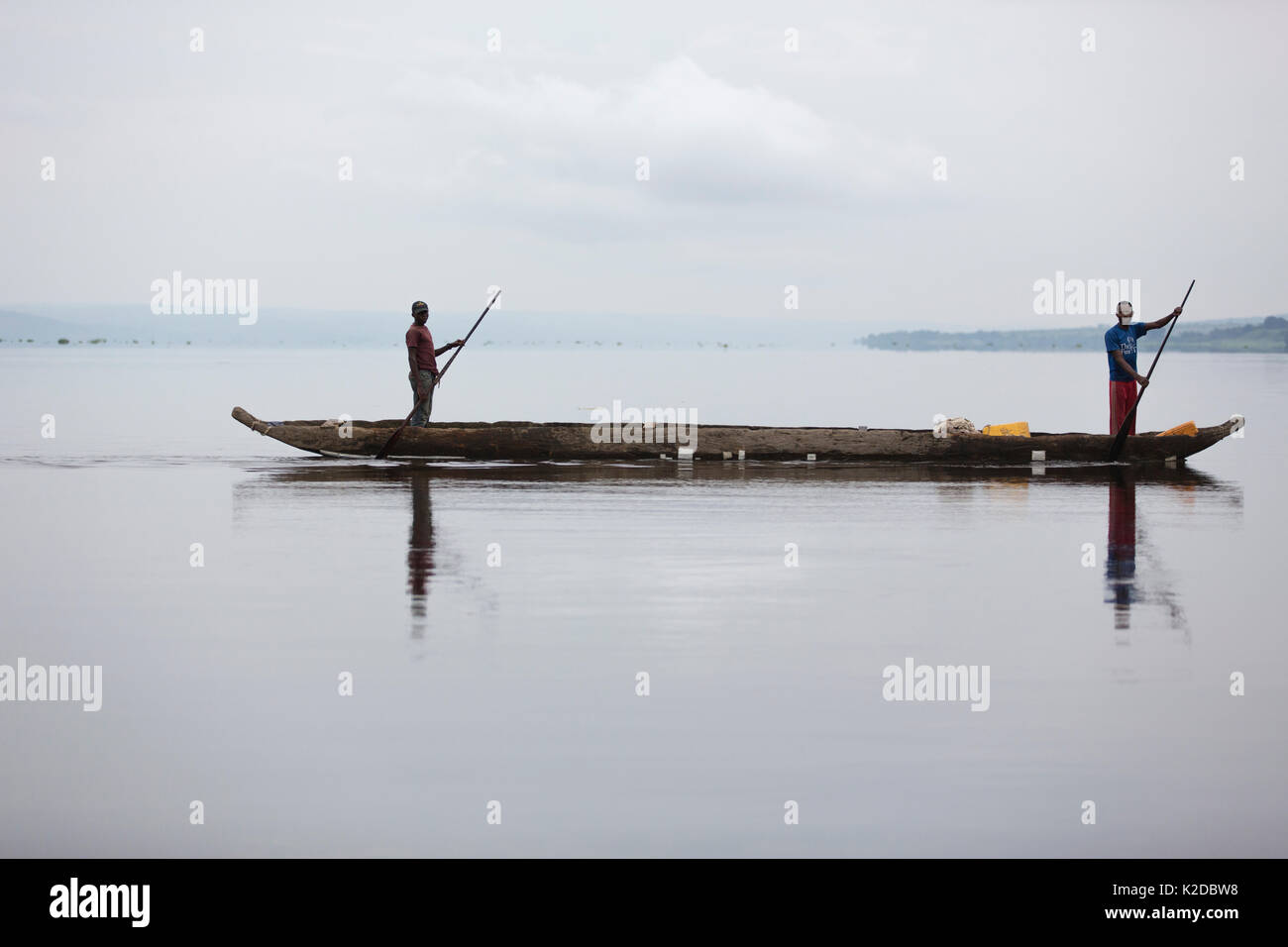 People crossing Congo river with goods to trade, the river is the border between Congo Brazzaville and Democratic Republic of Congo (DRC) Stock Photo
