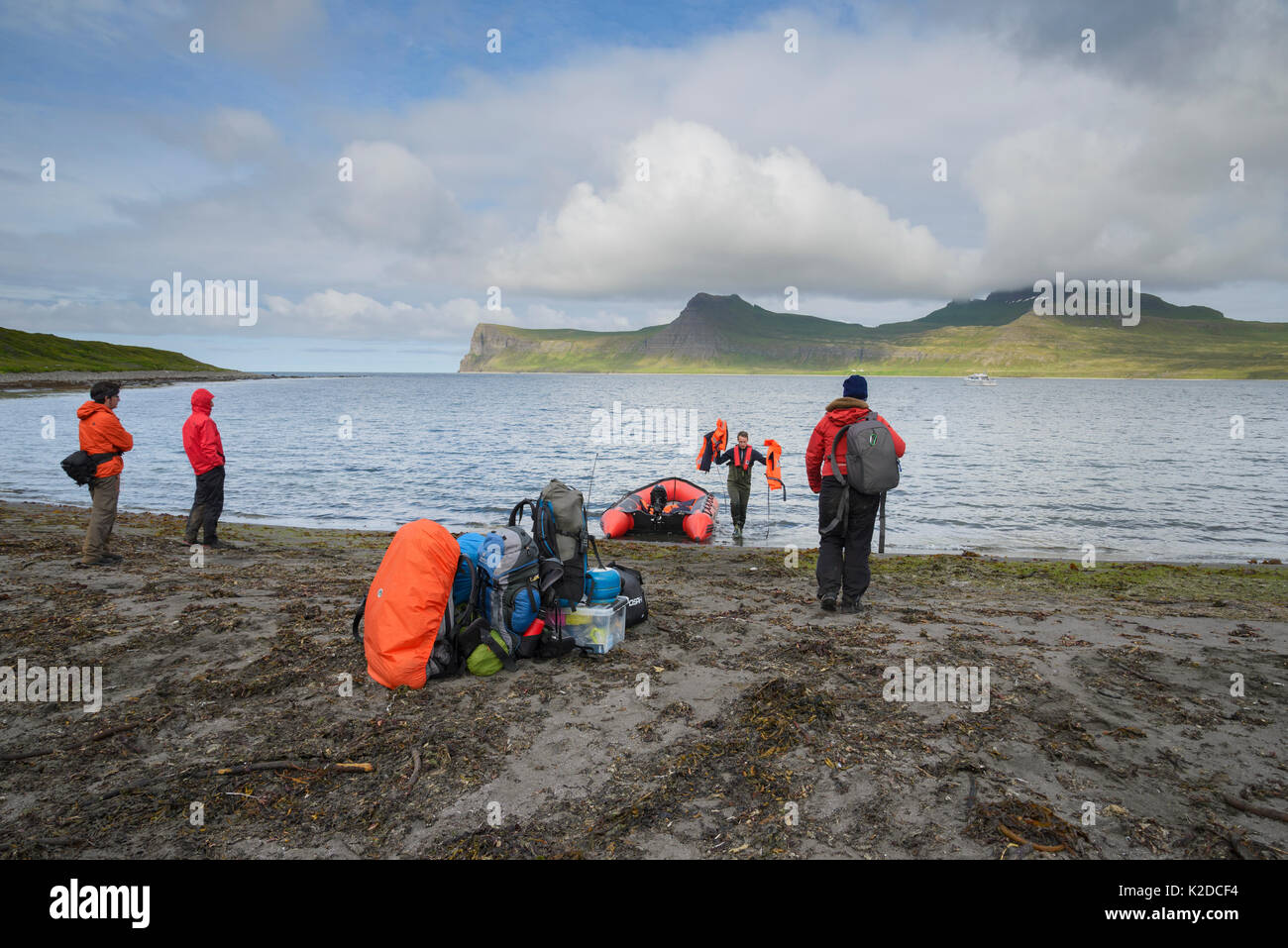 Small boat dropping off hikers, Hornvik, Hornstrandir, Iceland. July