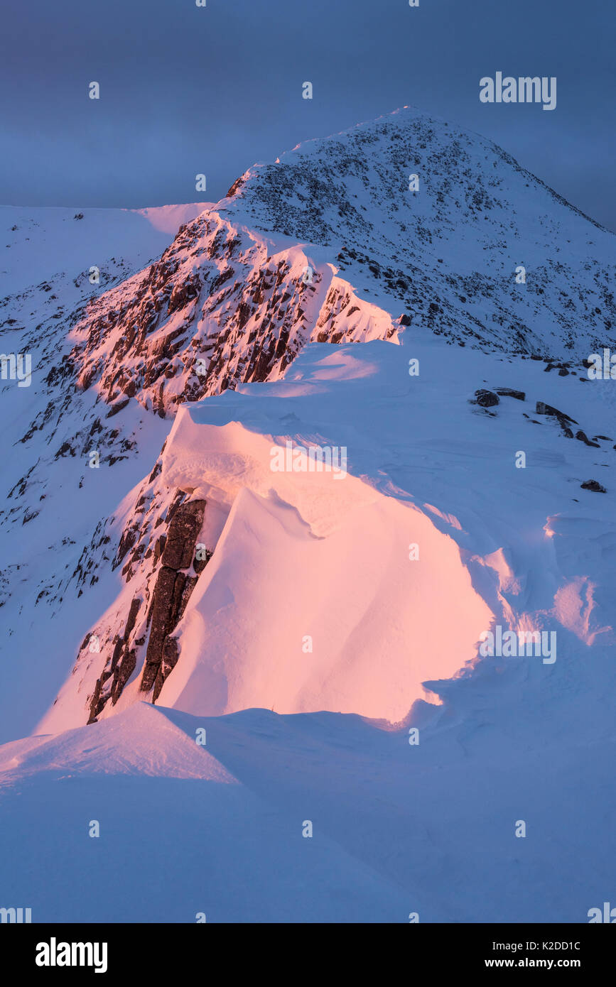 First light on Ben Starav ridge in full winter conditions. Glen Etive, Highlands of Scotland, UK, January 2016. Stock Photo