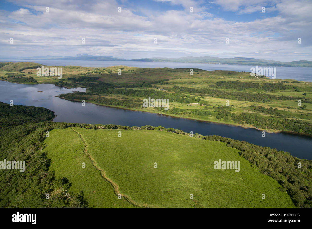 Aerial view from Barr Mor, Taynish National National Nature Reserve overlooking Linne Mhuirich and out to the paps of Jura, Argyll and Bute, Scotland, UK, June 2016. Stock Photo