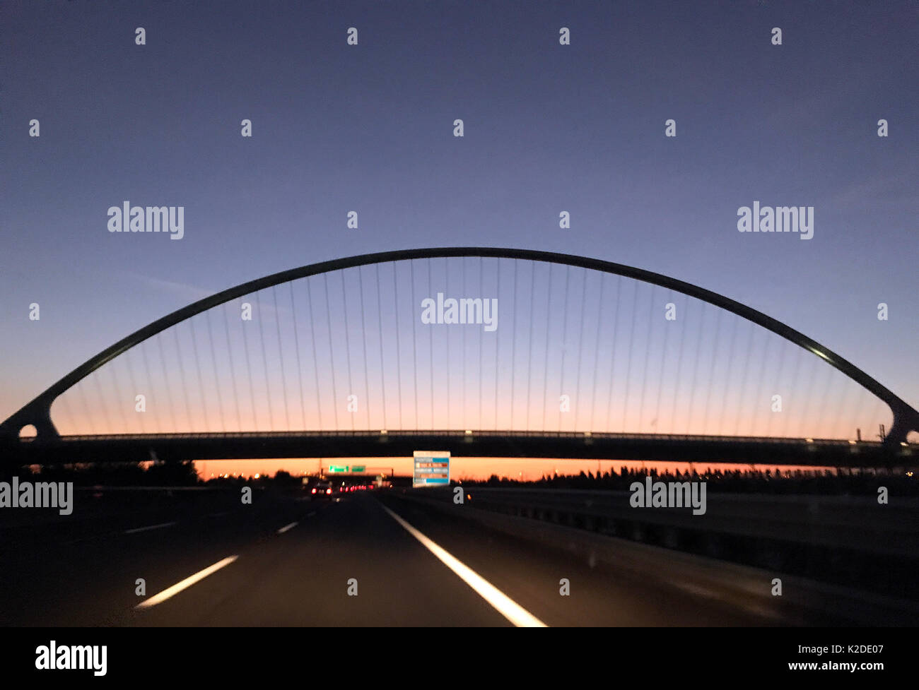 View from the car of the bridge designed by Santiago Calatrava from A1 highway, Reggio Emilia, Italy Stock Photo