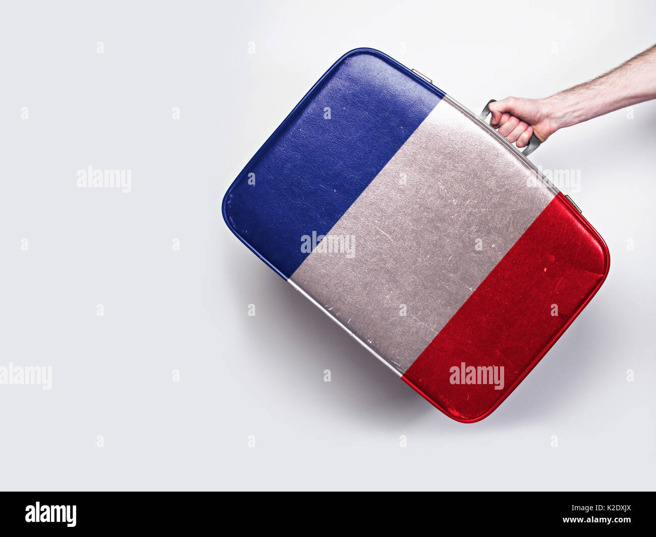 France flag on a vintage leather suitcase Stock Photo Alamy