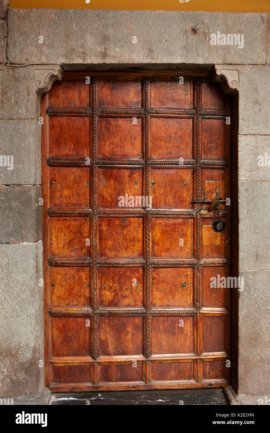 Old door at the Church and Convent of Santo Domingo, built on the foundations of Coricancha Inca Temple, Cusco, Peru, South America Stock Photo