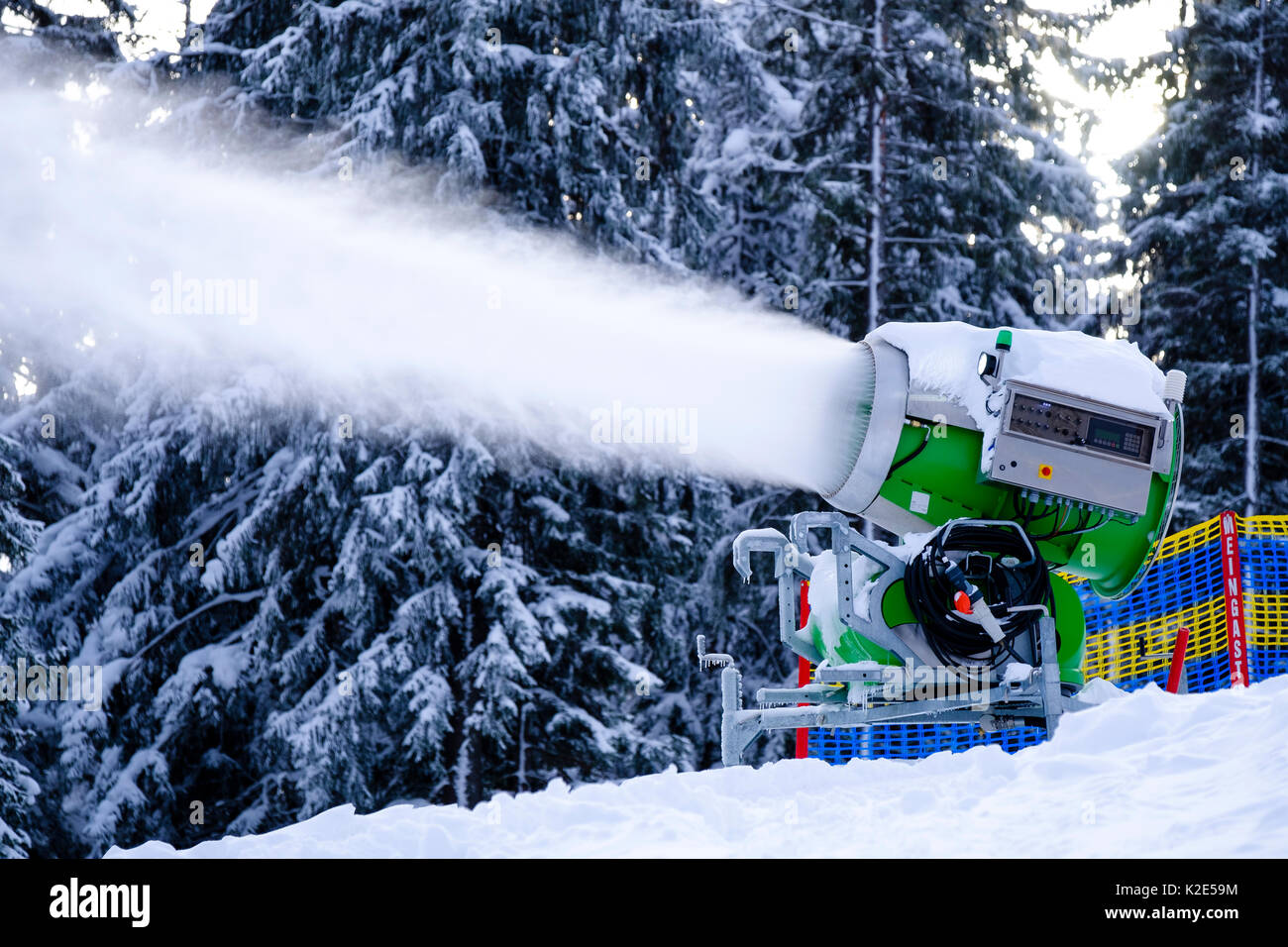 Snow cannon in operation, ski resort Götschen, Bischofswiesen, Bavaria, Germany Stock Photo