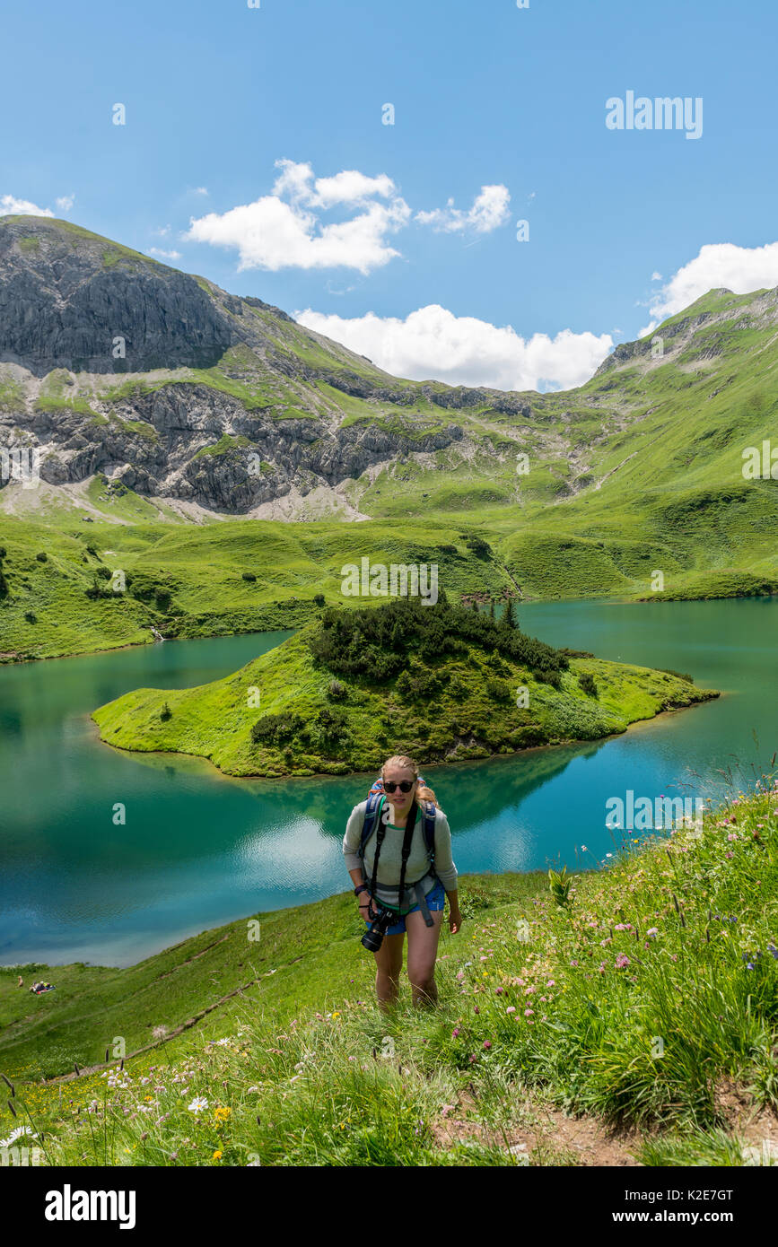 Hiker on hiking trail, Schrecksee and Allgäu Alps, Bad Hindelang, Allgäu, Bavaria, Germany Stock Photo