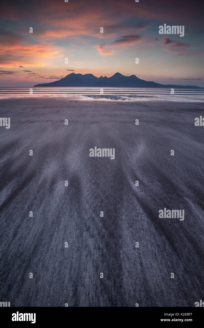 Twilight at Bay of Laig, Isle of Eigg towards Isle of Rum, Inner Hebrides, Scotland, UK, April 2014. Stock Photo