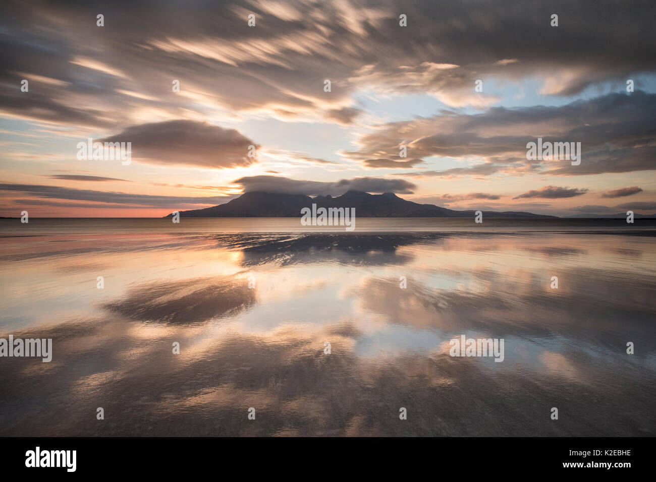 Twilight over Bay of Laig, Isle of Eigg towards Isle of Rum, Inner Hebrides, Scotland, UK, April 2014. Stock Photo