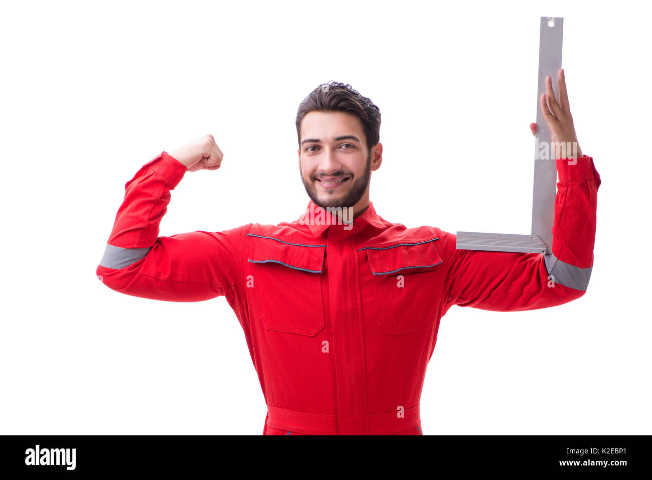 Young repairman with a square ruler isolated on white background Stock ...