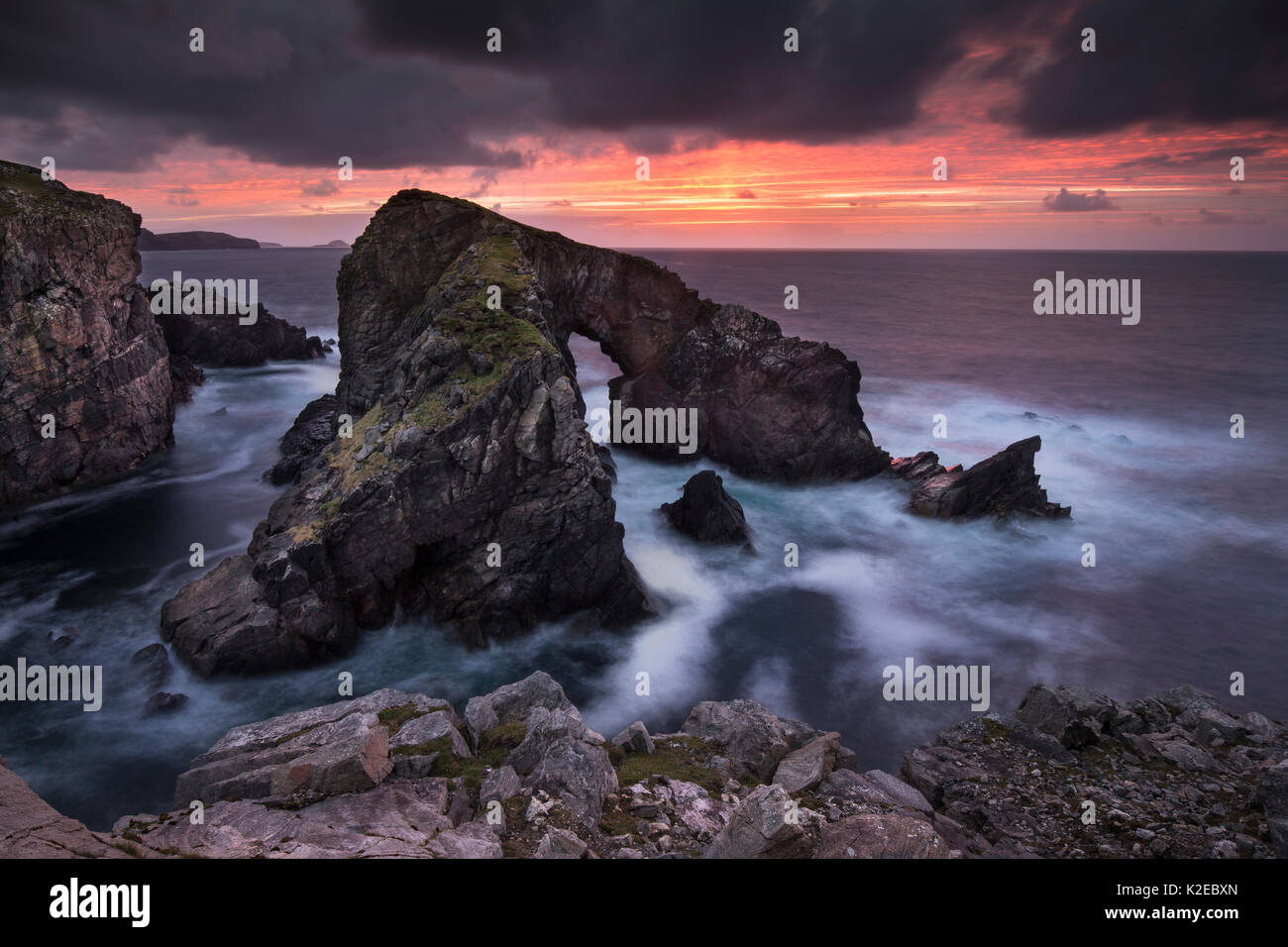 Rock archway at sunset, Isle of Lewis, Outer Hebrides, Scotland, UK, September 2014. Stock Photo