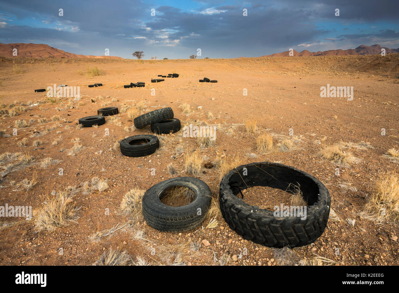 Pollution in the Namib Desert, due to illegal dumping of old tires. Namibia. Stock Photo