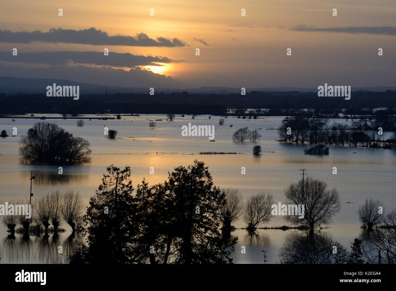 Overview of flooding across Lower Salt Moor and North Moor at sunset, seen from from Barrow Mump, Burrowbridge, Somerset Levels, England, UK, February 2014. Stock Photo