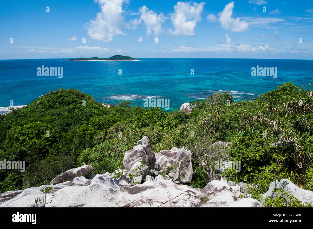 Cousine Island, a privately owned island and nature reserve, one of the few remaining rat-free islands of the inner Seychelles, off the south-west coast of Praslin Island, seen from Cousin Island, Republic of Seychelles Stock Photo