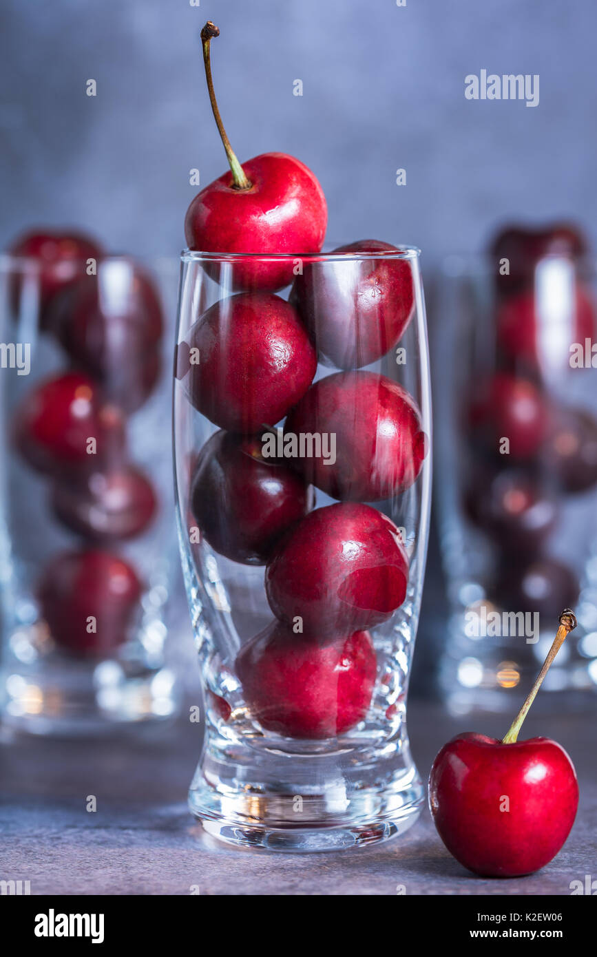 Cherries in glassware Stock Photo