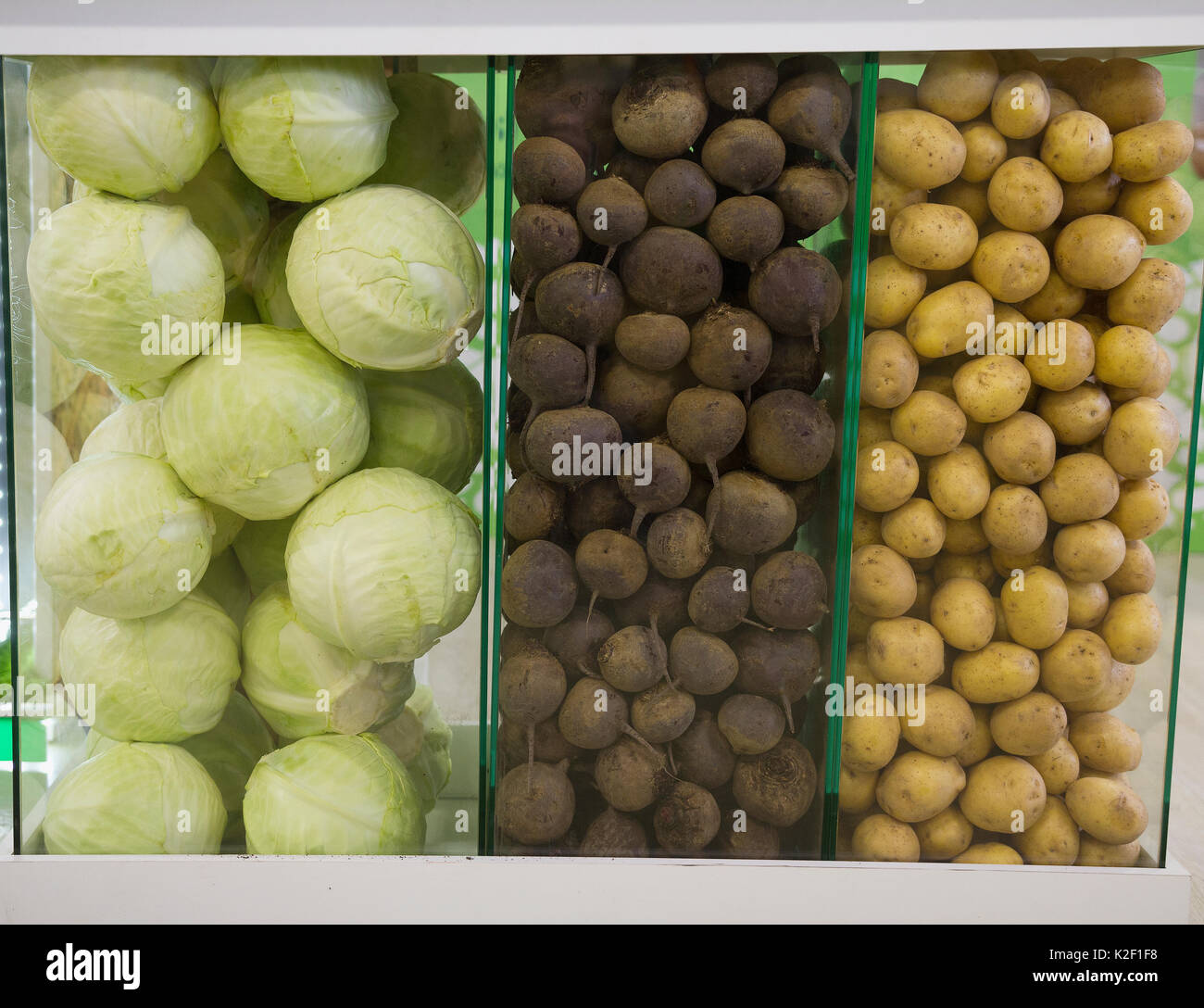 Vegetables in supermarket turnips, potato and cabbage at grocery store Stock Photo Alamy