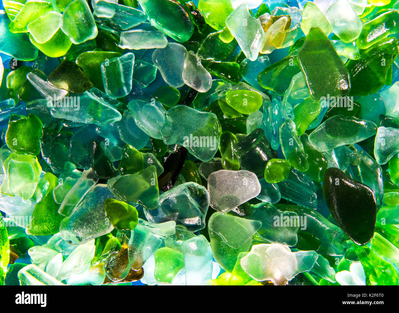 broken glass rolled with water background Stock Photo
