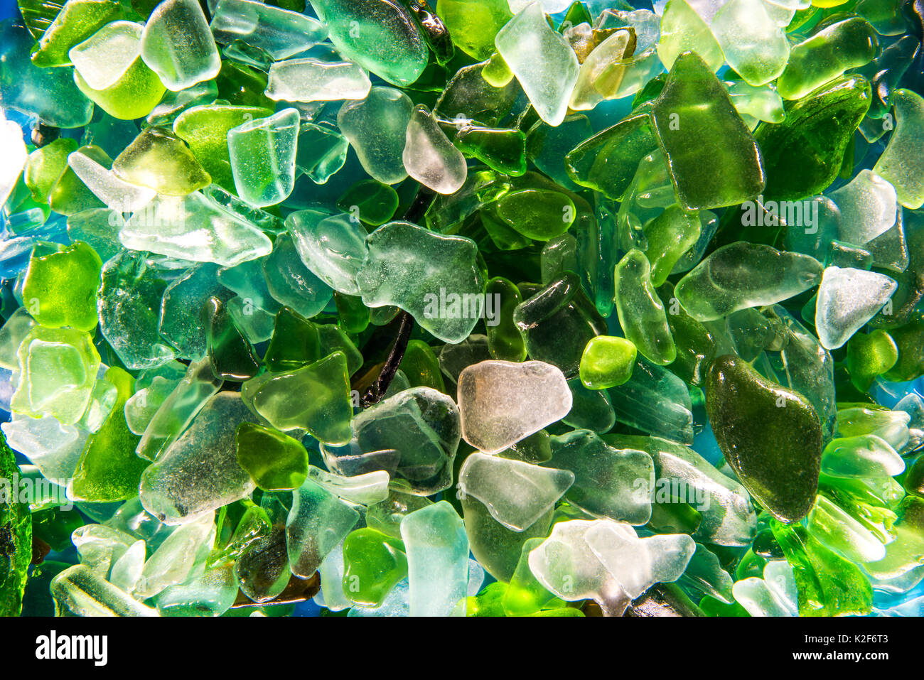 broken glass rolled with water background Stock Photo