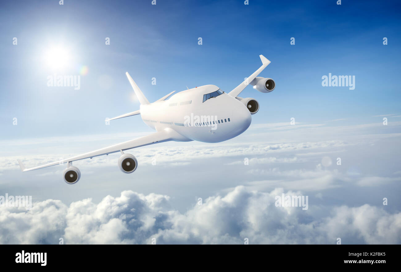 Airplane flying above clouds Stock Photo - Alamy
