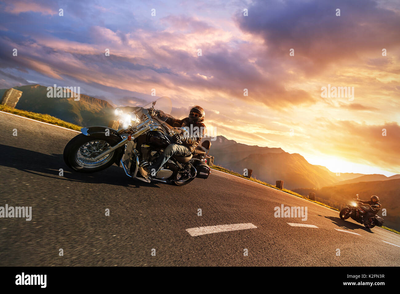 Motorcycle drivers riding in Alpine highway, Hochalpenstrasse, Austria ...