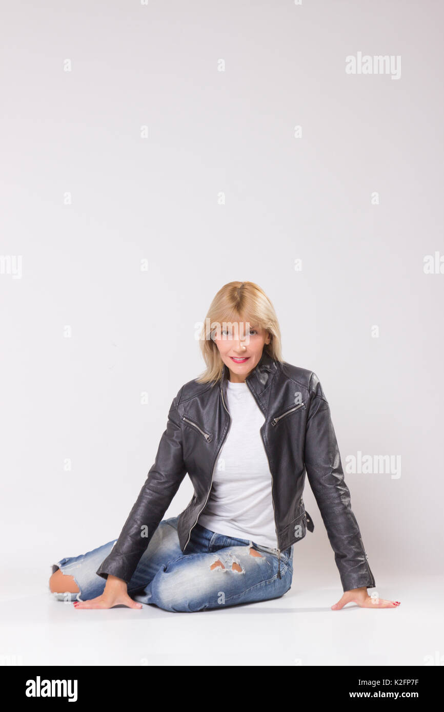 Beautiful fit mature woman sitting hi-res stock photography and images ...