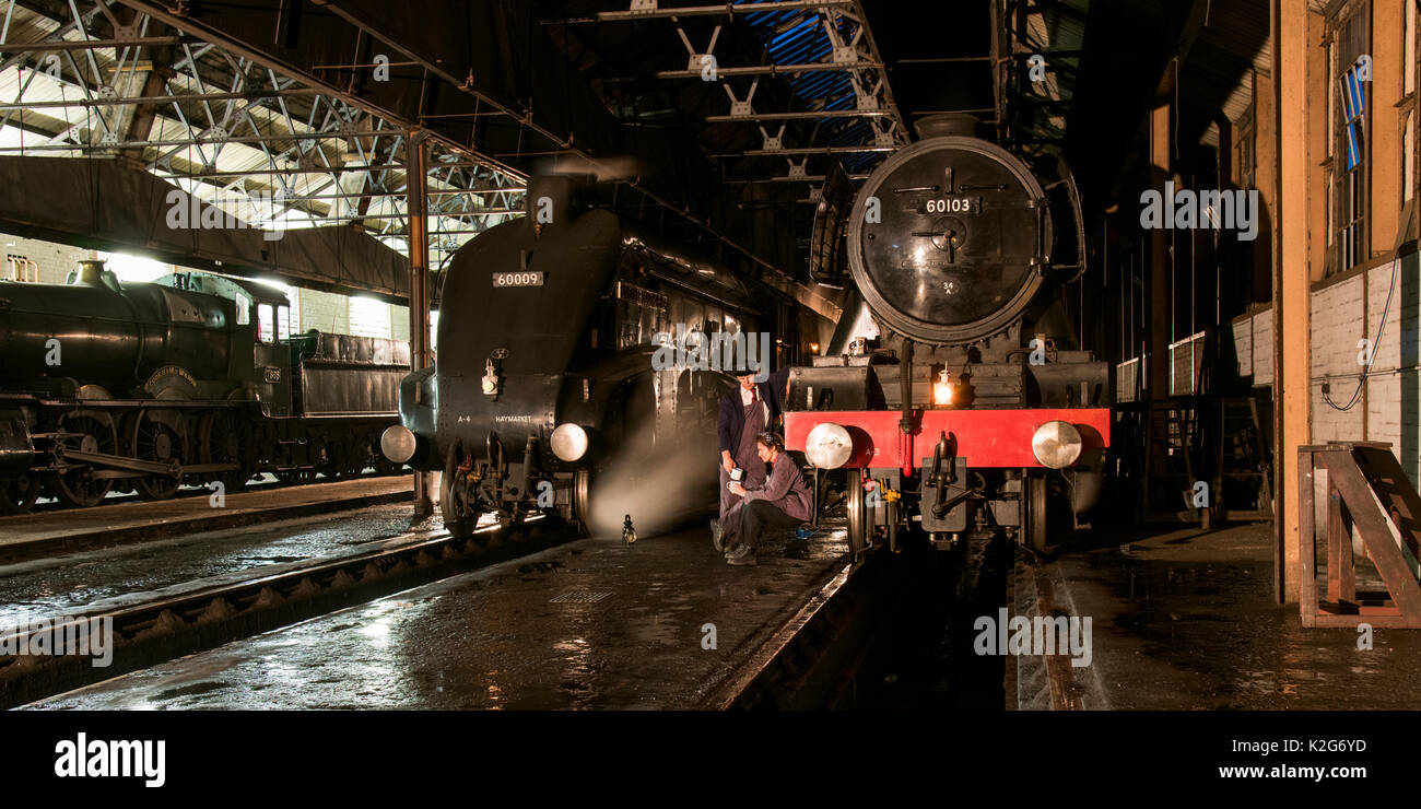 Flying Scotsman Steam Locomotive at night in the maintenance shed with Union of South Africa Stock Photo