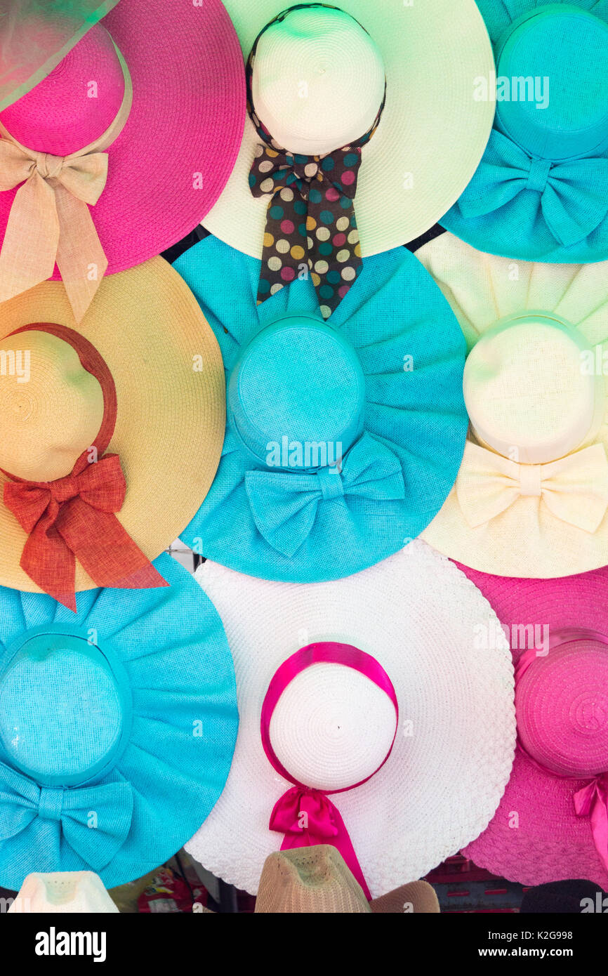 Colourful hats for sale on a market stall Stock Photo Alamy