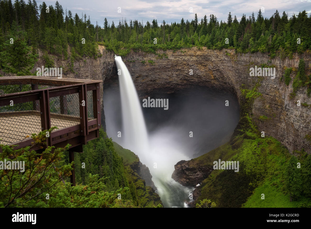 Helmcken Falls and an outlook platform in Wells Gray Provincial Park near Clearwater, British Columbia, Canada. Long exposure. Stock Photo