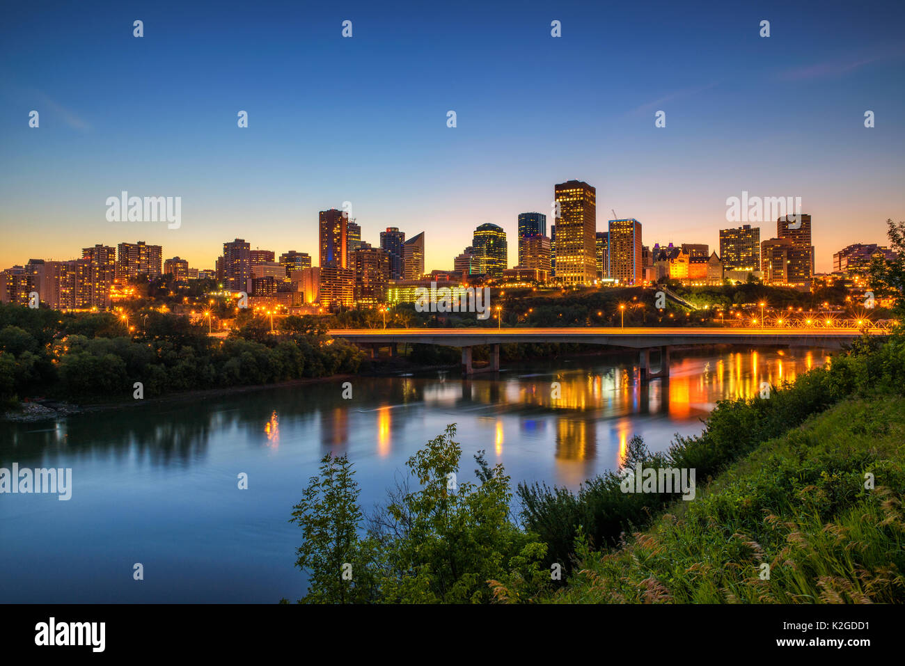 Edmonton downtown, James Macdonald Bridge and the Saskatchewan River at night, Alberta, Canada. Long exposure. Stock Photo