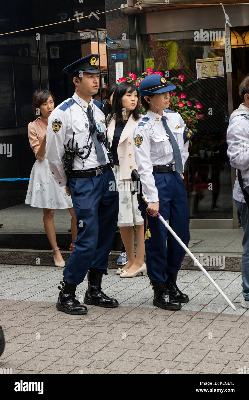 Tokyo, Japan - May 14, 2017:Japanese police is watching the parade at the Kanda Matsuri Festval Stock Photo