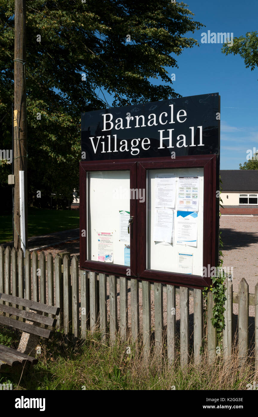 The village hall and notice board, Barnacle, Warwickshire, England, UK