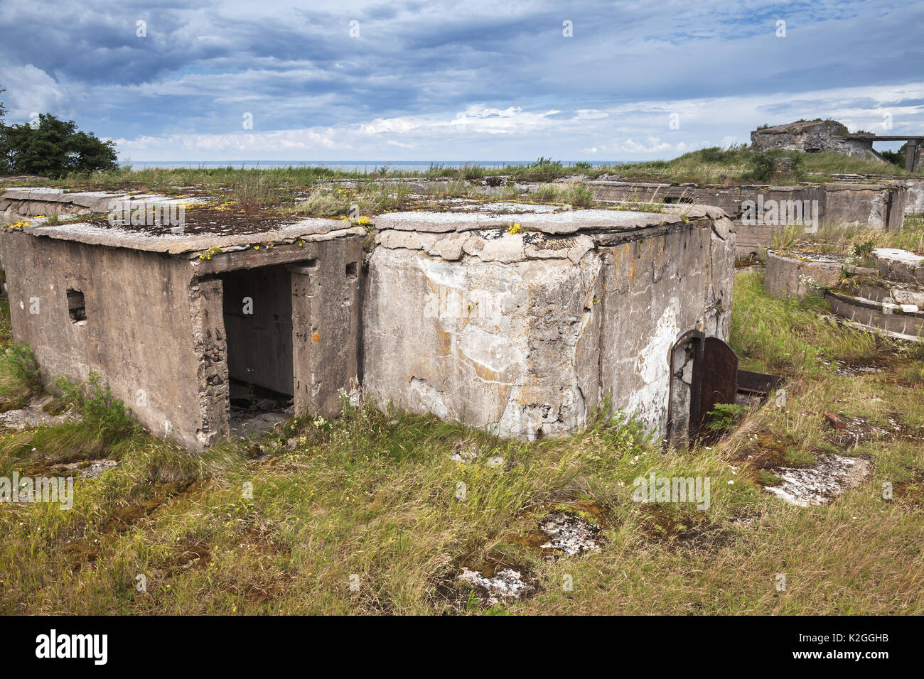 Old abandoned concrete bunker from WWII period on Totleben fort island in Gulf of Finland near Saint-Petersburg in Russia Stock Photo