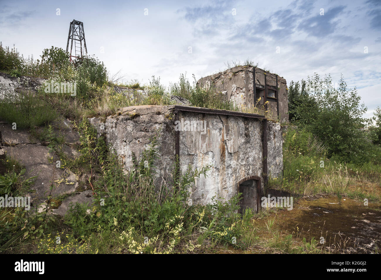 Old abandoned concrete bunker from WWII period on Totleben fort in Gulf of Finland near Saint-Petersburg in Russia Stock Photo