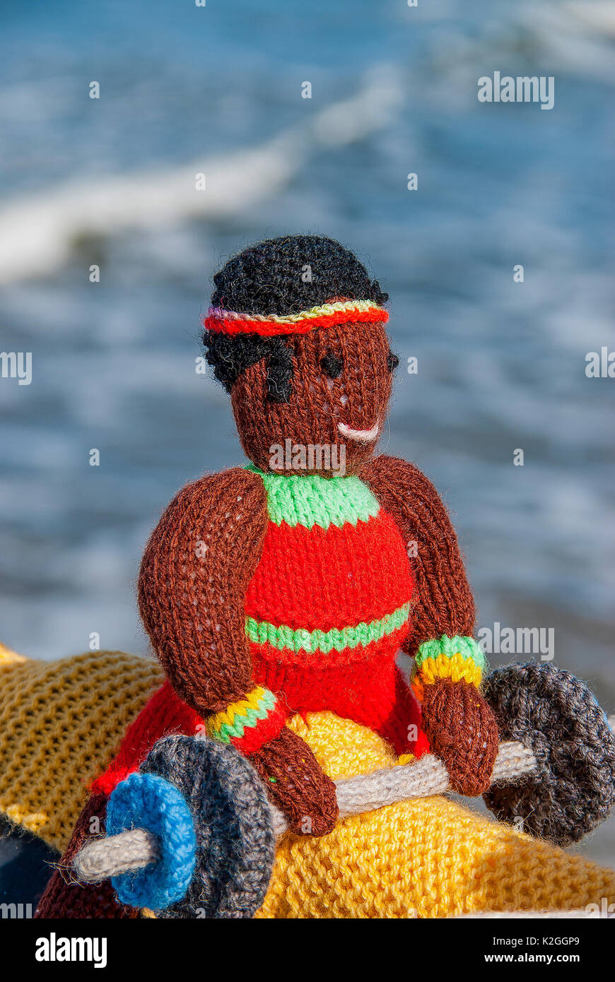 knitted weight lifter yarn bombing on saltburn pier for the olympic