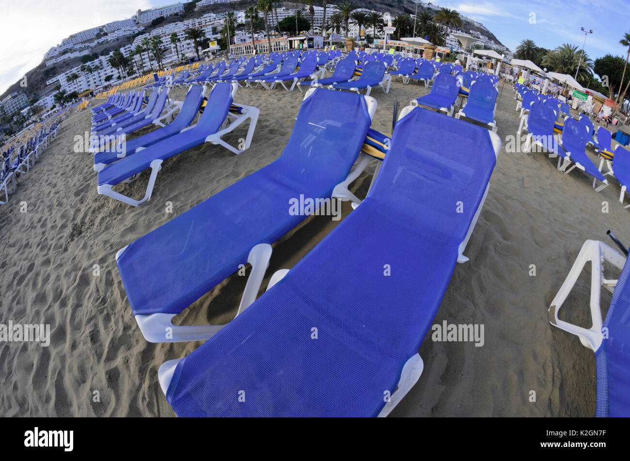 Deck chairs on the beach, Puerto Rico, Gran Canaria, Spain Stock Photo
