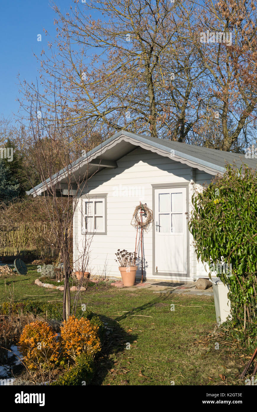 Garden house in a wintery allotment garden Stock Photo