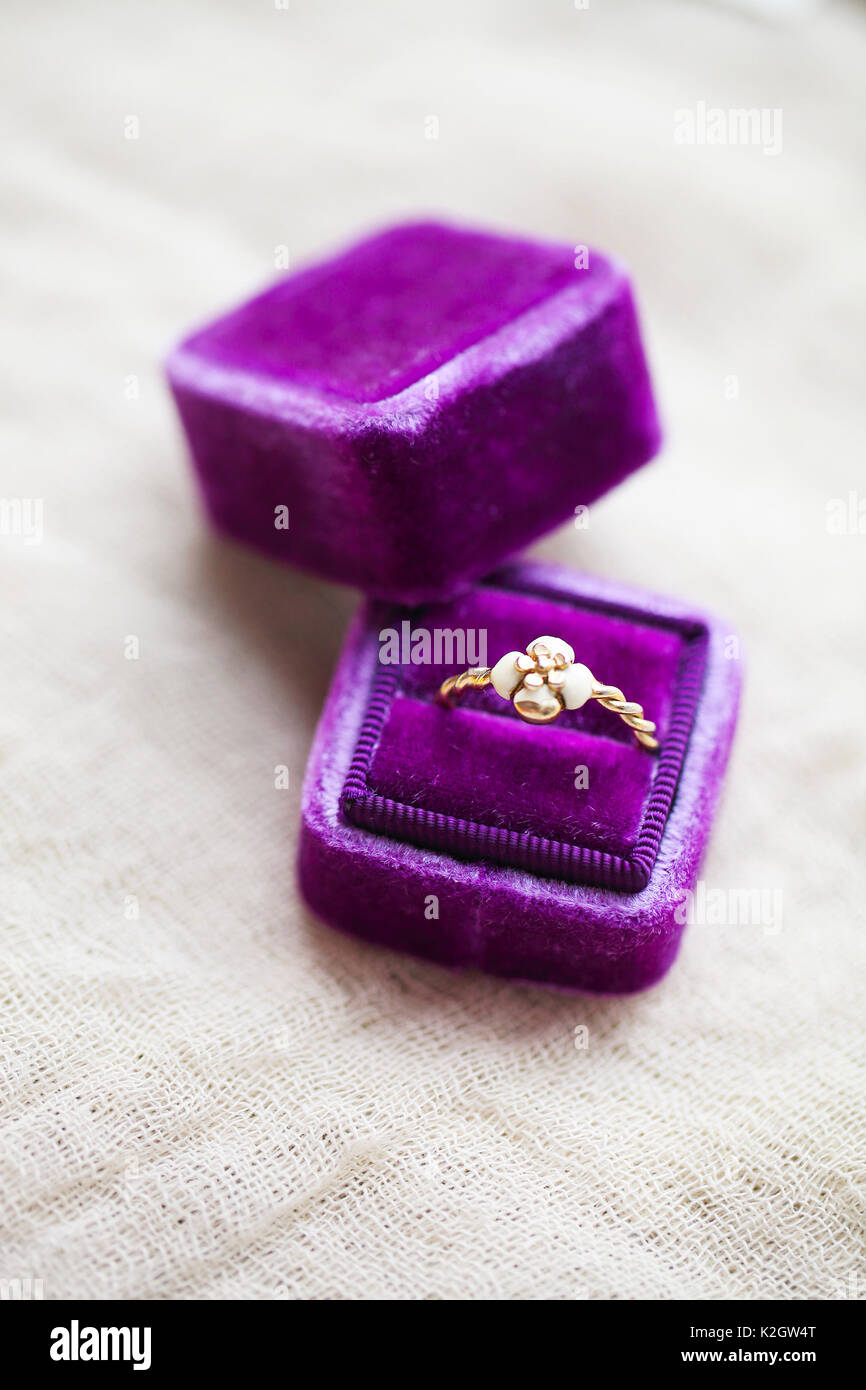 Engagement ring in the box on gray background Stock Photo Alamy
