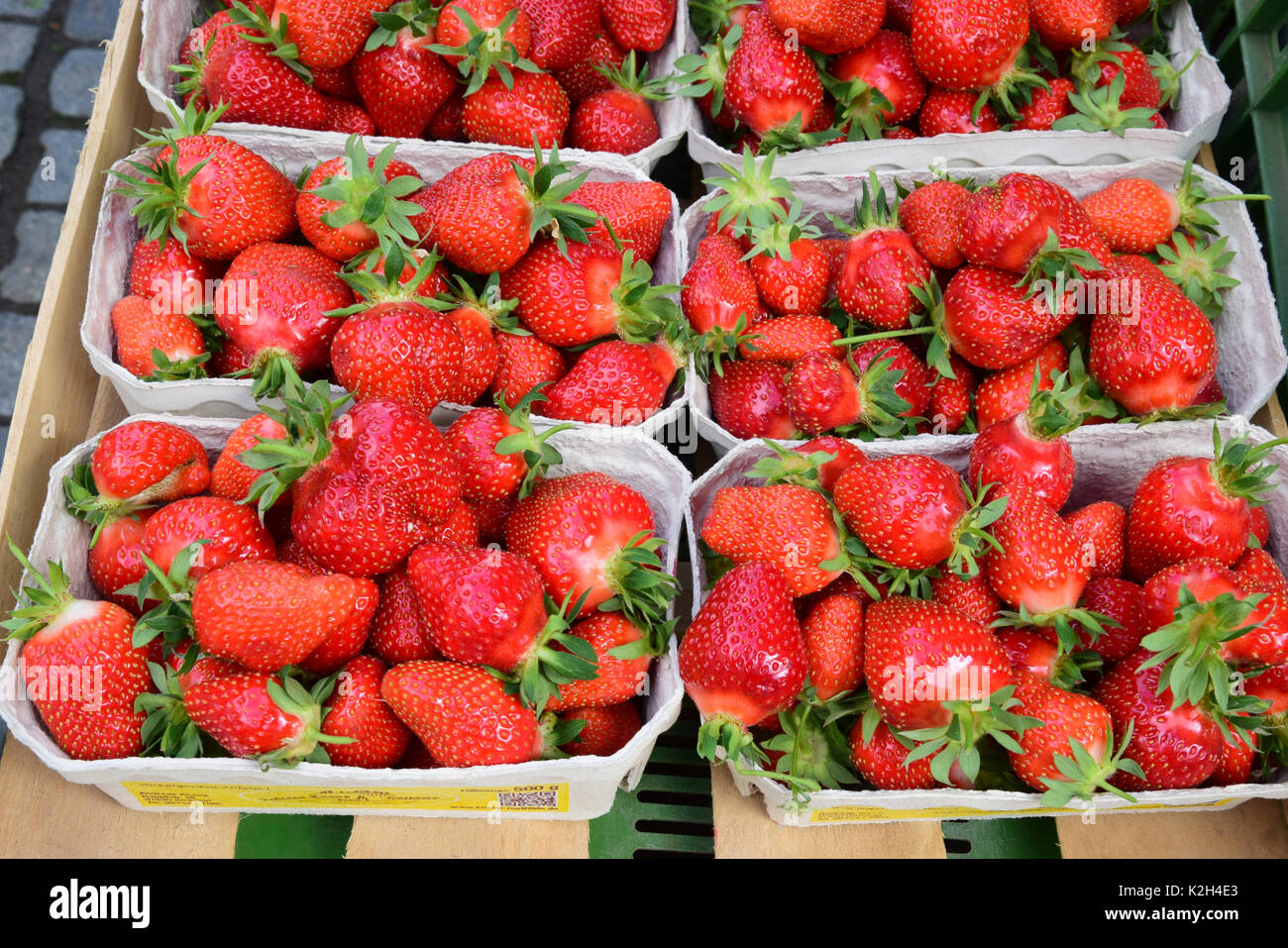 Garden Strawberry  (Fragaria x ananassa) being presented in a market stall Stock Photo