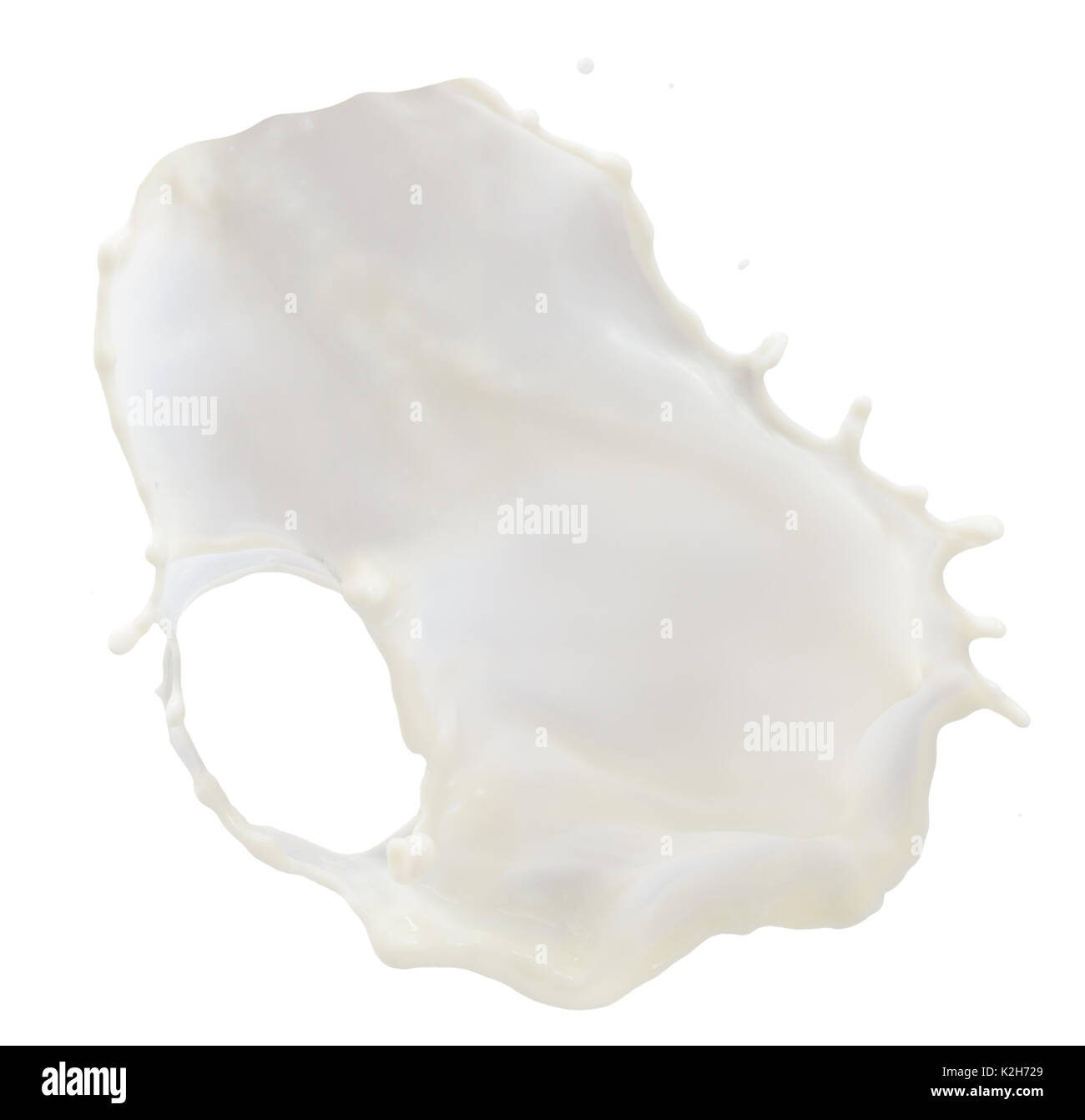 milk splash isolated on a white background Stock Photo - Alamy