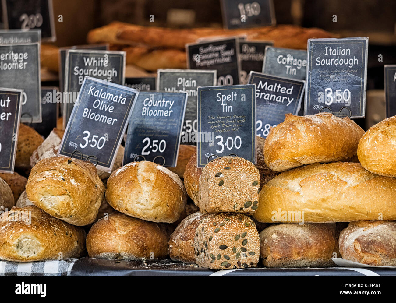 CAMBRIDGE, UK - AUGUST 11, 2017:   Artisan specialist bread for sale with price label at the market Stock Photo