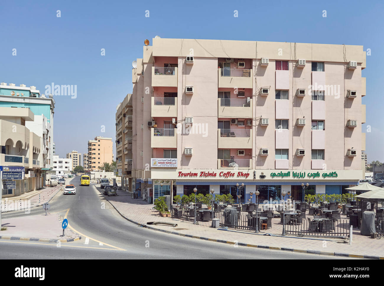 Ajman, United Arab Emirates - May 3, 2017: Street of Ajman on a summer day, the capital of the emirate of Ajman. Stock Photo