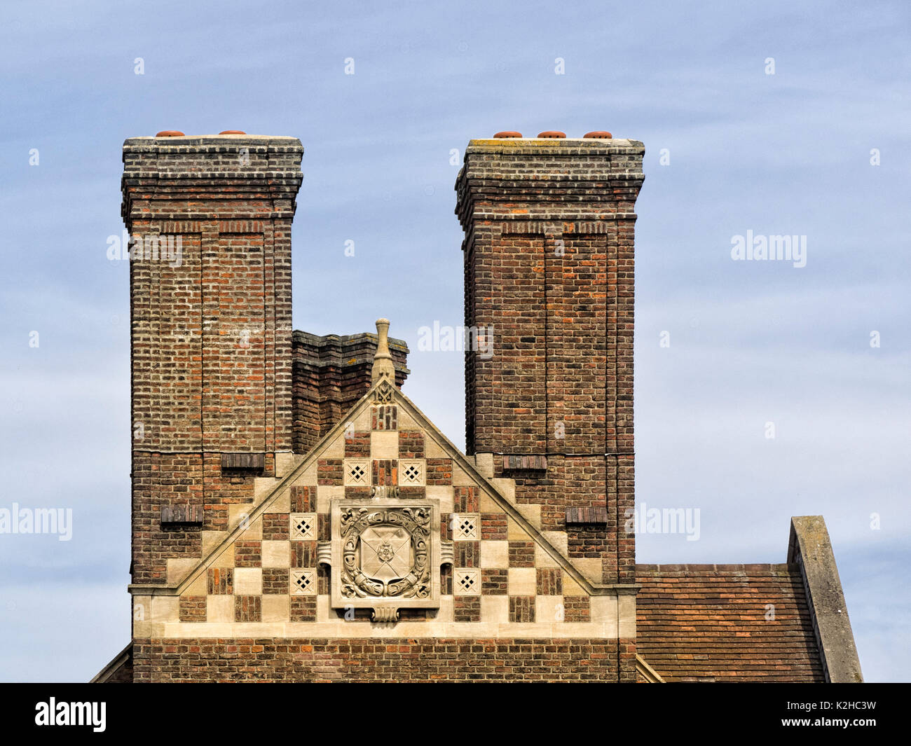 CAMBRIDGE, UK - AUGUST 11, 2017:  The impressive brick chimneys and gable on the Magdalene College building Stock Photo