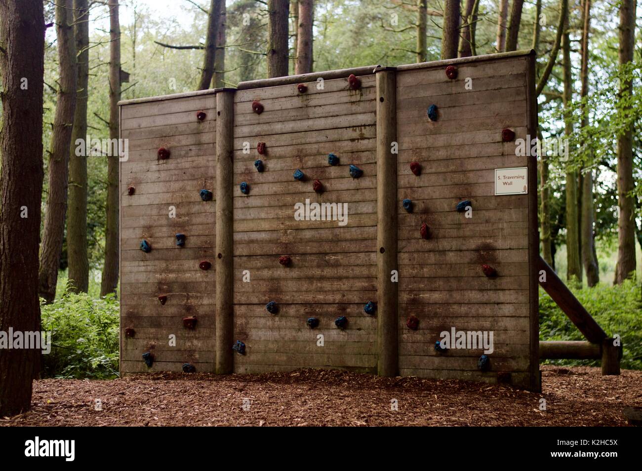 Climbing wall in the woods Stock Photo Alamy