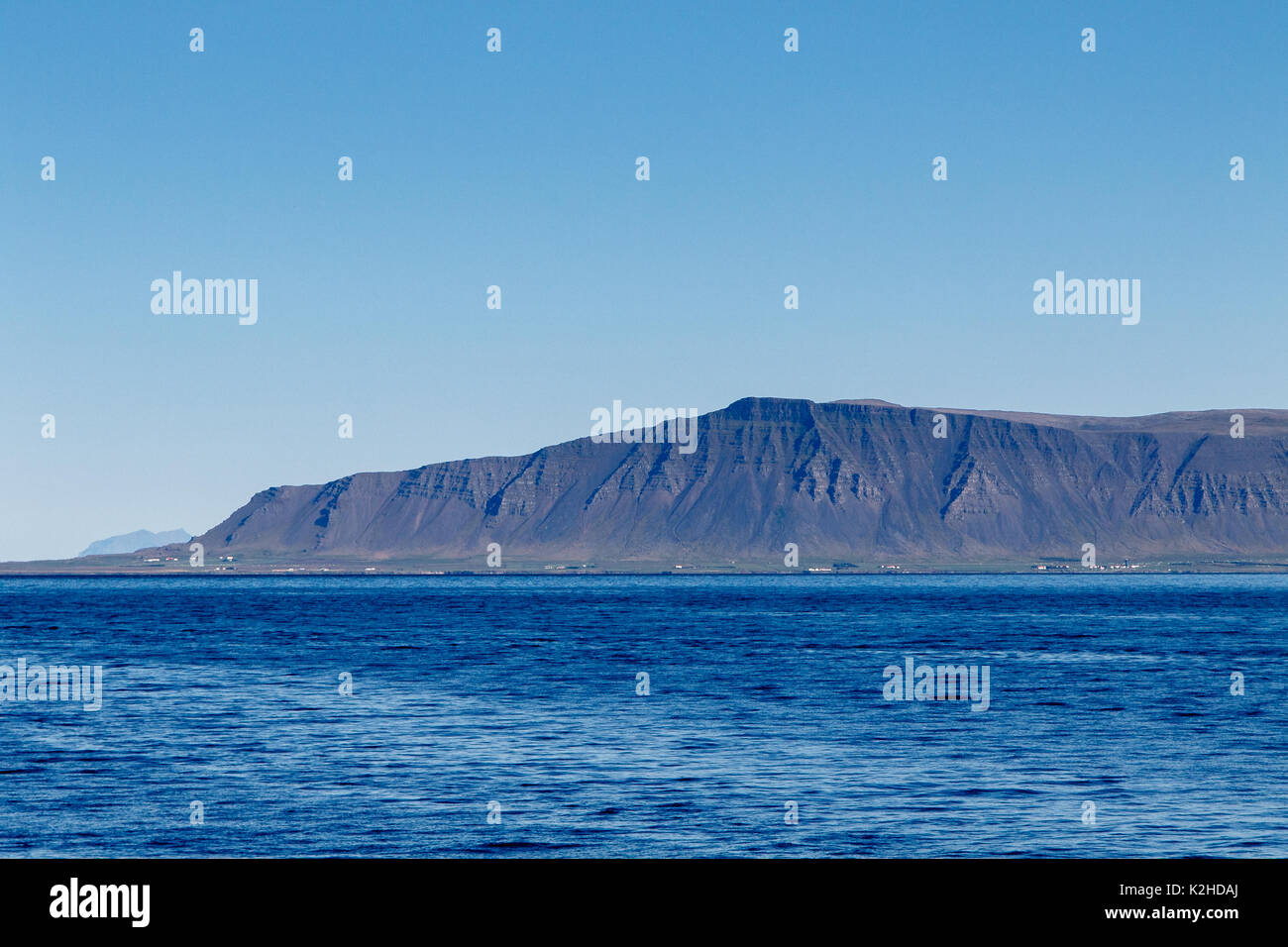 Icelandic landscape with mountains and ocean. Stock Photo