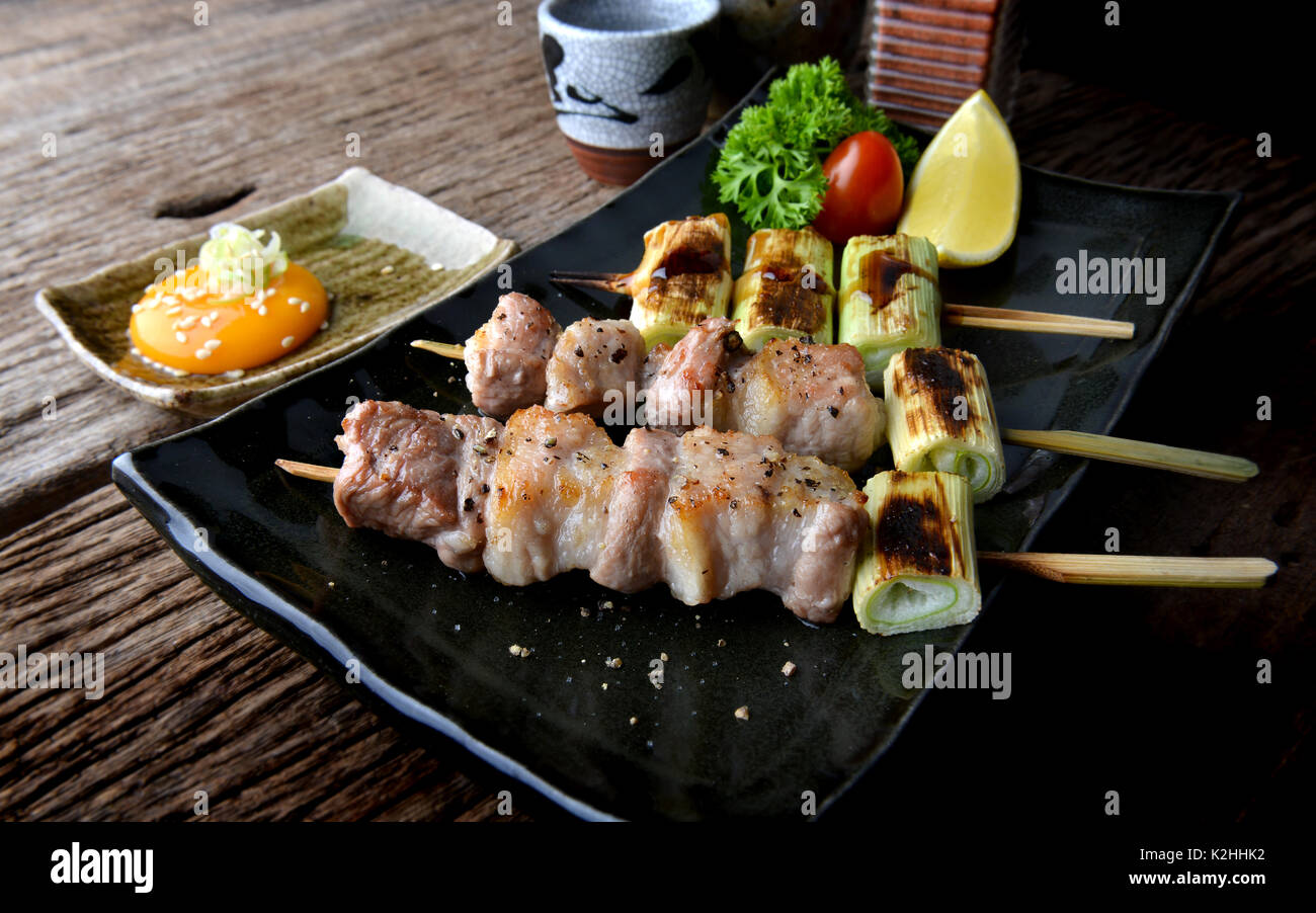 Butabara yakitori or Japanese bacon pork grill with salt and sauce
