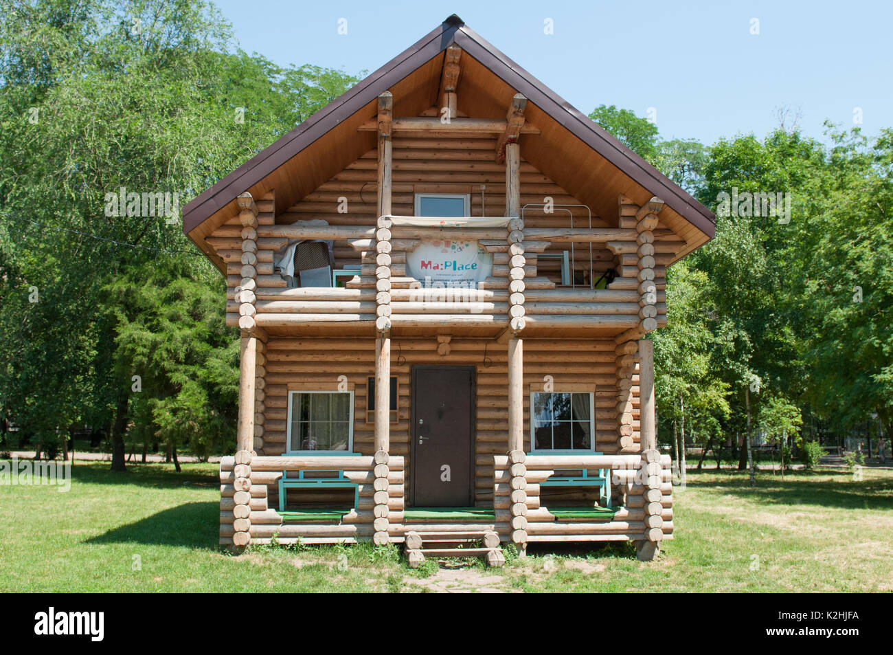 Russian wooden village house. It built of logs. Stock Photo