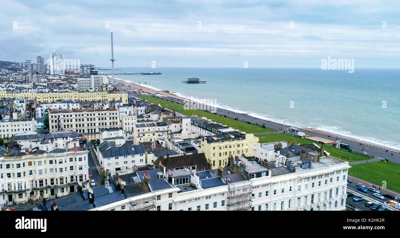 Aerial view of the town of Brighton and Hove towards the beach and the two piers Stock Photo