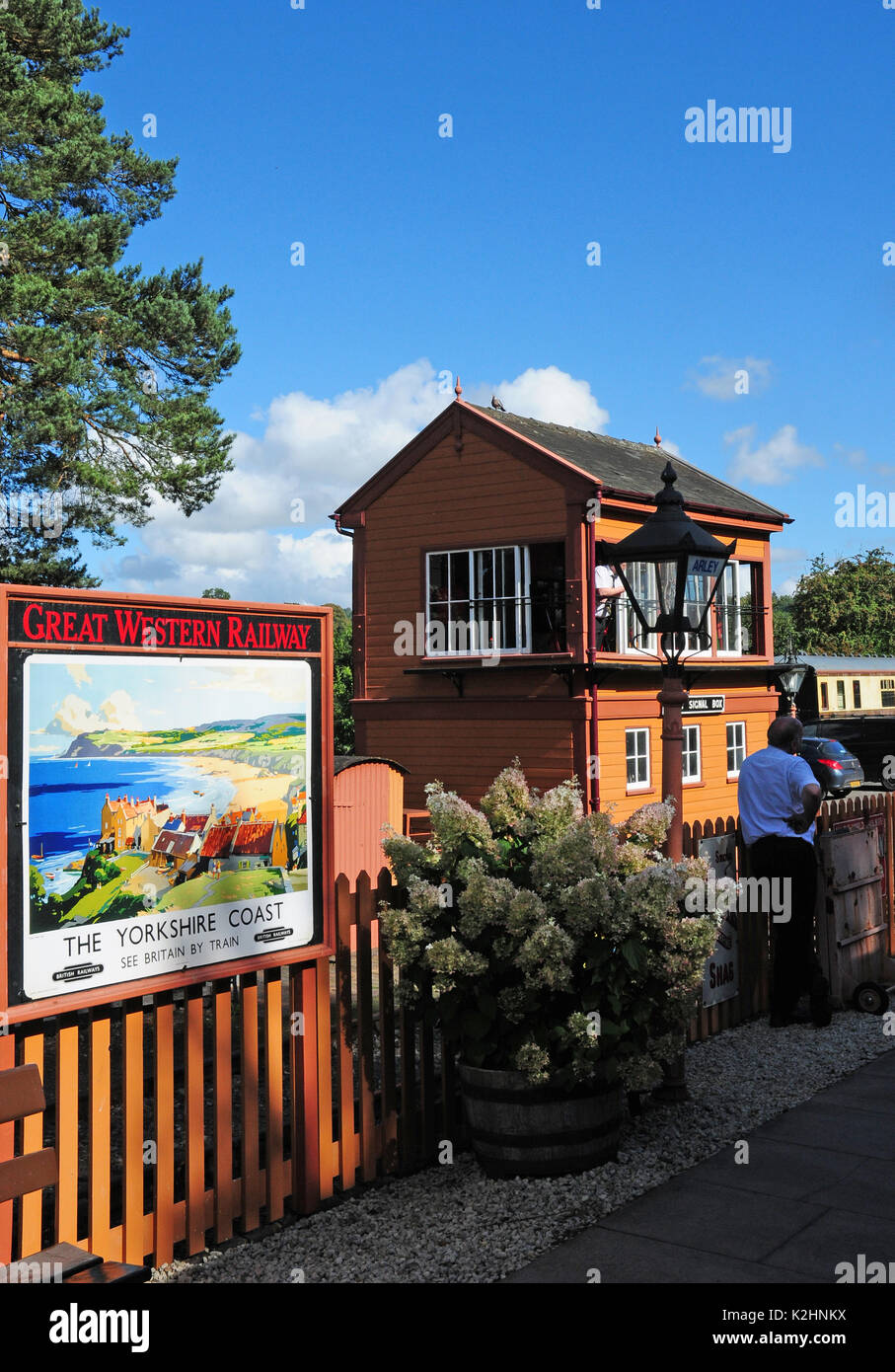 Signal box, preserved Great Western Railway poster and lamp at Arley on Severn Valley Railway, Shropshire. Stock Photo