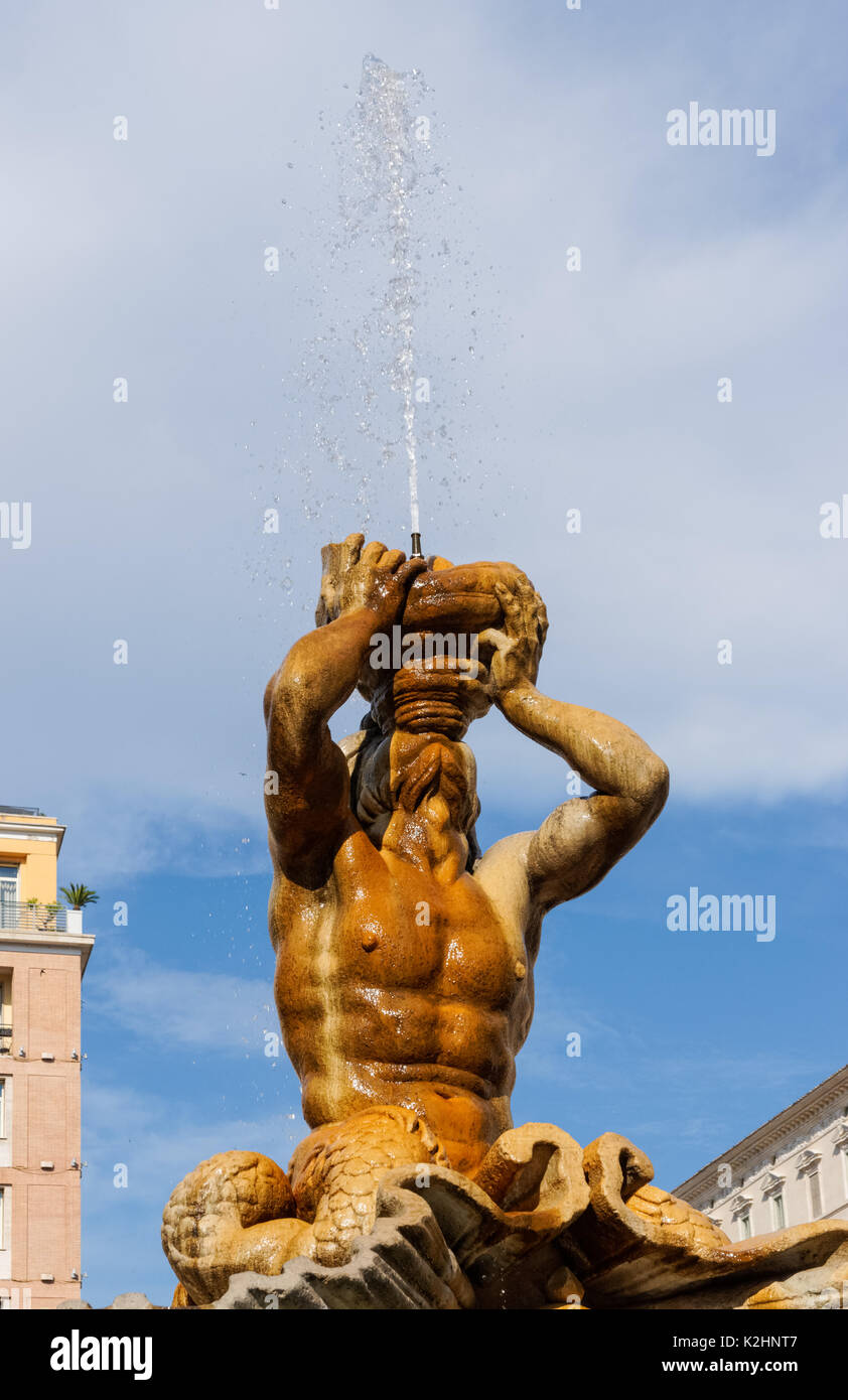 Triton Fountain at the centre of the Piazza Barberini in Rome, Italy Stock Photo