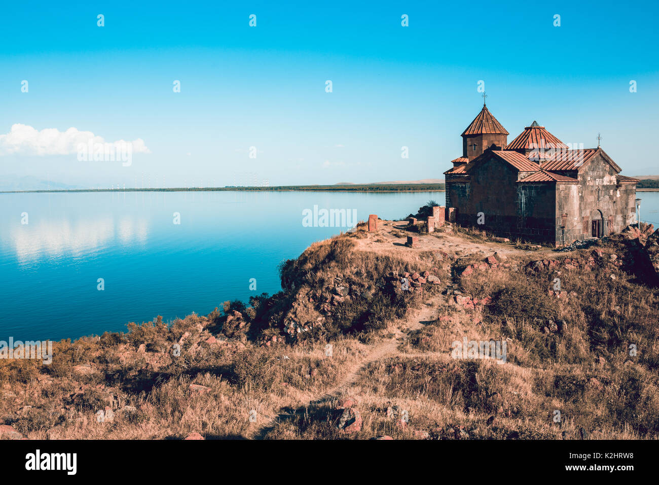 Ancient church in Armenia. Hayravank Monastery on the shore of lake Sevan. Travel destination. Concept of travel and exploration. Stock Photo